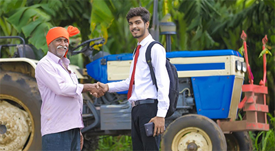 Farmer Shaking Hand with an Engineer